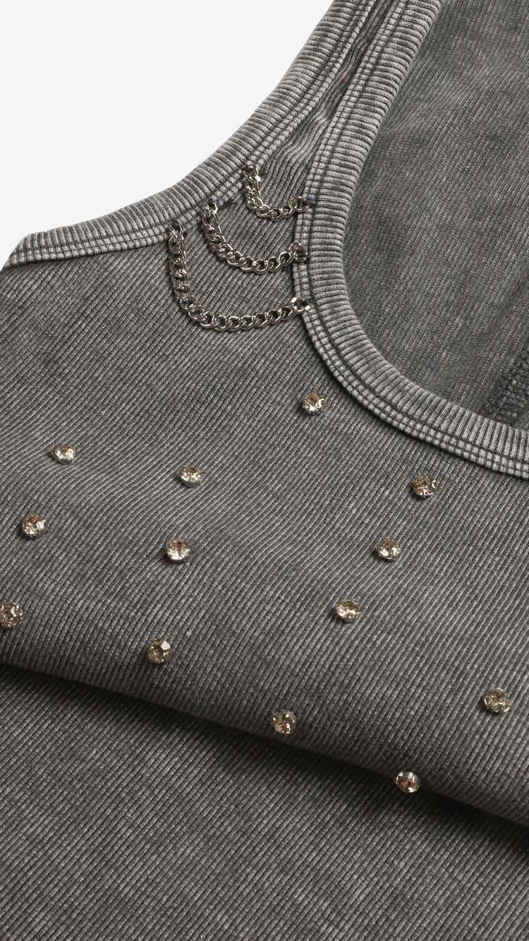 Dark grey tank top with embellishments on a white background
