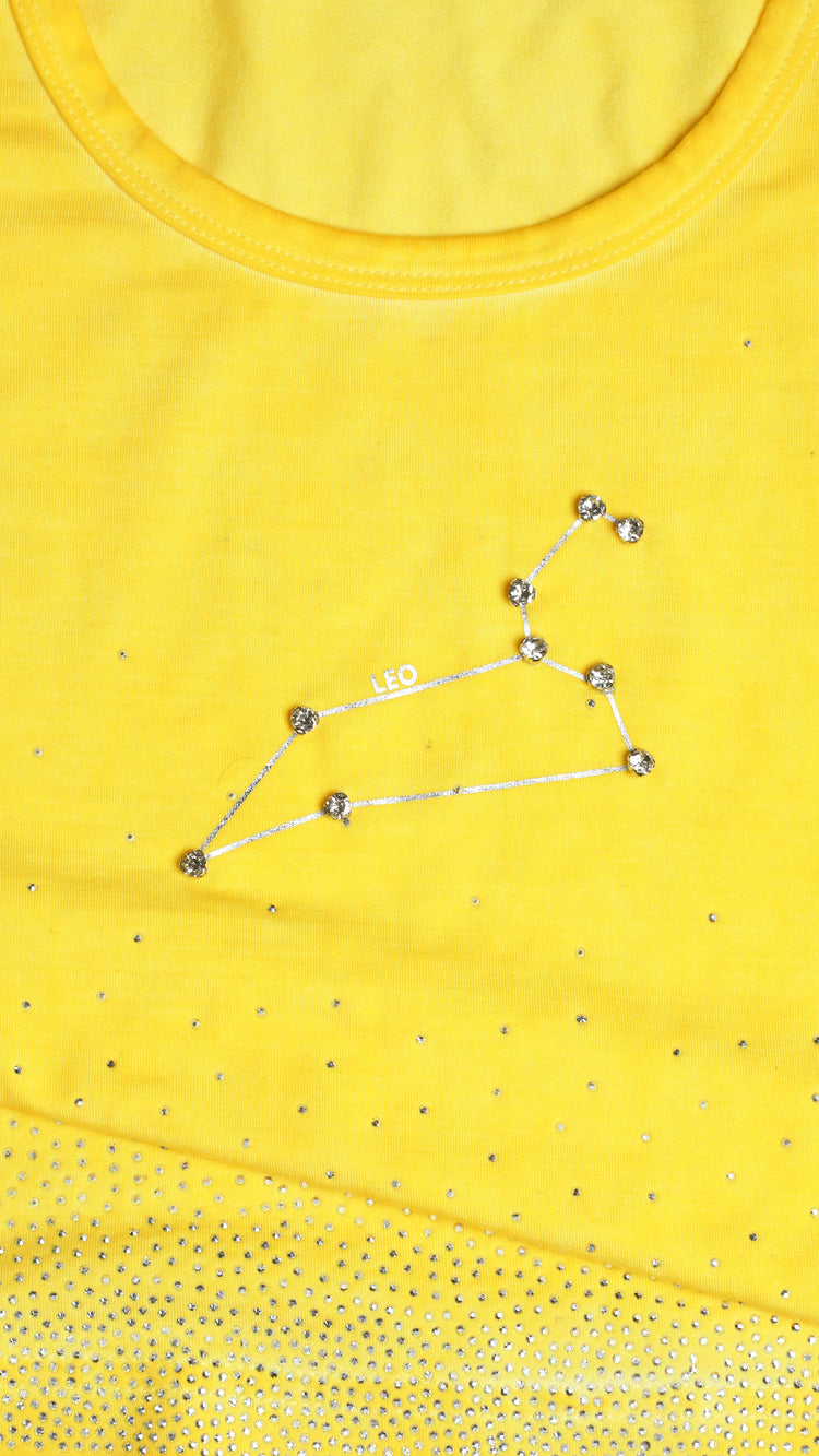 Yellow top with a star constellation design.