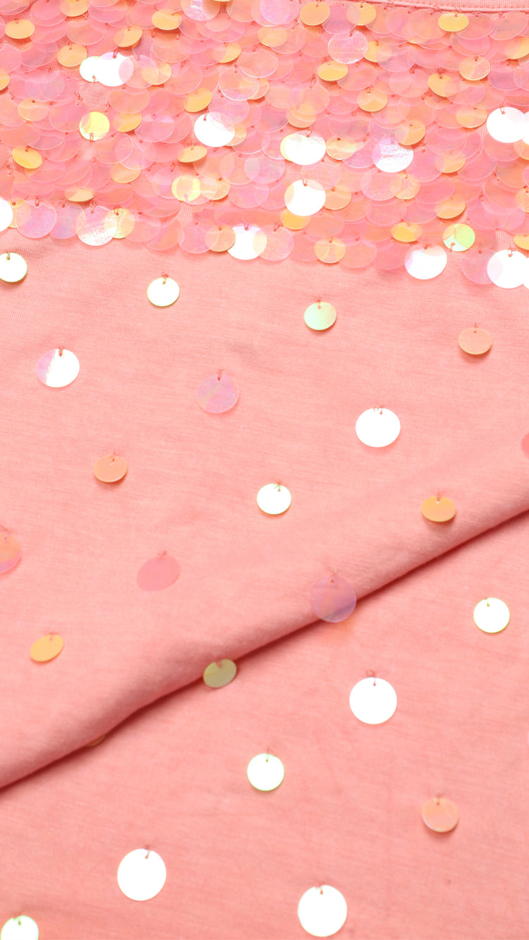 Detailed shot of peach sequinned camisole
