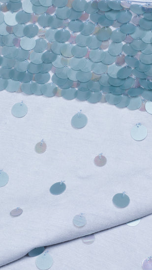 Detailed shot of a sequin blue camisole