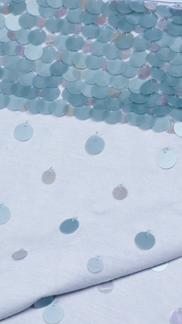Detailed shot of a sequin blue camisole