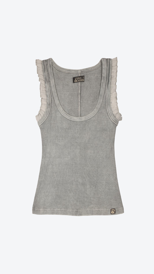 Gray tank top with ruffled trim on a white background
